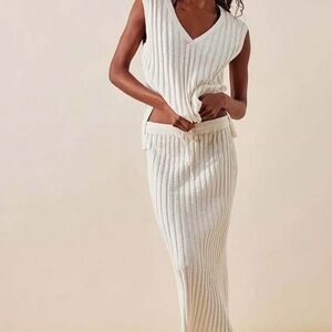 Elegant Cream Free People Beach Ribbed Skirt and tank top.